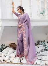 Lavender silk saree with embroidery and cut work border, paired with matching butti blouse – designer wedding wear.
